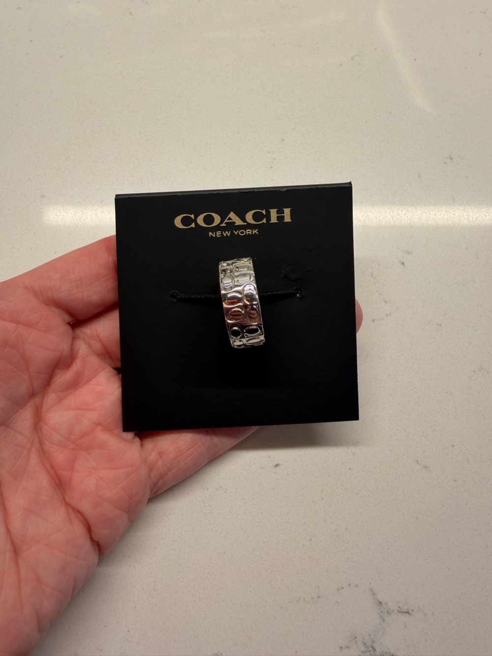COACH Silver-Tone Crystal Quilted C Wide Band Ring Size 6